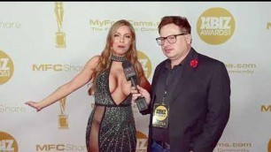 'Brittney Amber almost has a dress malfunction on the Xbiz Awards red carpet in Los Angeles, CA.'