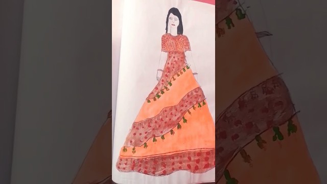 'fashion designer drawing gown 