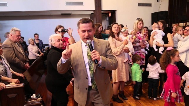 'Beth Shalom Church. Passover celebration. Kids blessing.'