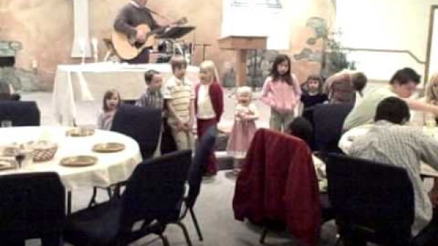 'Kids singing Dayenu at Passover Seder'