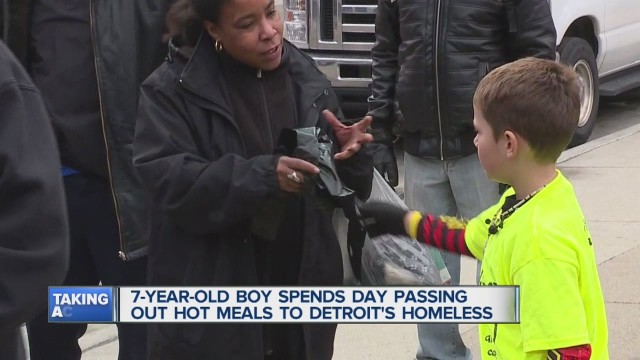 'Boy spends day giving out food to homeless'