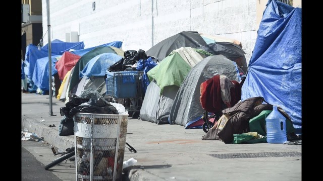 'Giving Food to the Homeless in Skid Row in Los Angeles'