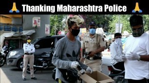 'THANKING MAHARASHTRA POLICE,HELPING HOMELESS PEOPLE AND STRAY DOGS.GIVING THEM FOOD IN LOCKDOWN'