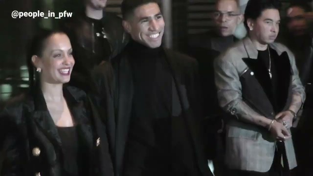 'Achraf Hakimi (PSG) and Hiba Abouk - Balmain Fall Winter 22/23 fashion show in Paris - 02.03.2022'