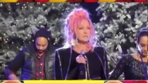 'CYNDI LAUPER makes fashion statement appearing at 2016 Hollywood Christmas Parade'